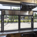 Quikserv air curtain mounted above a drive-thru window